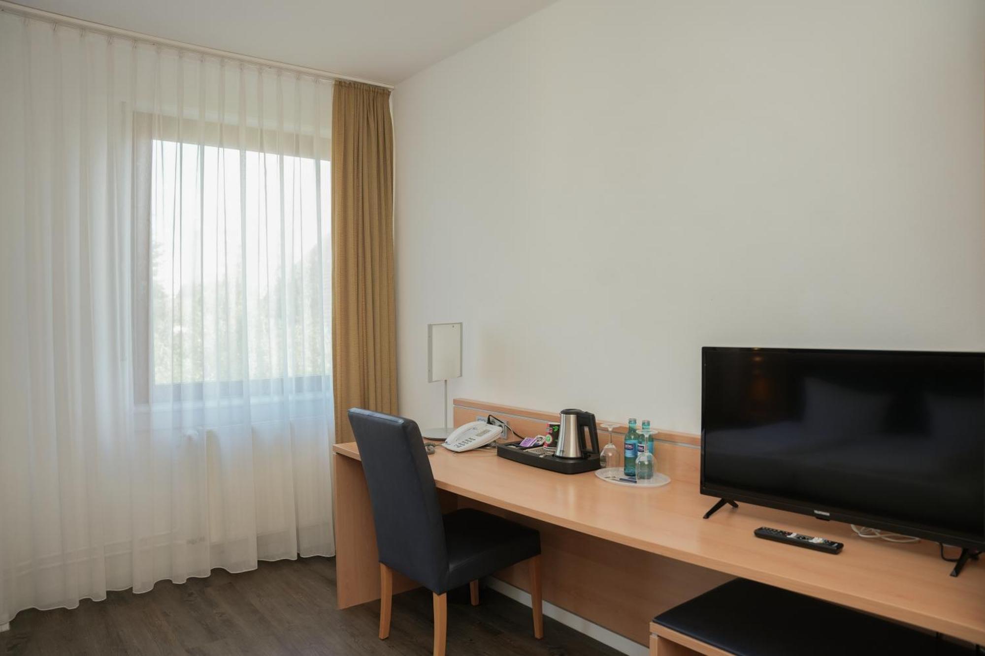 Standard Dreibettzimmer mit Klimaanlage